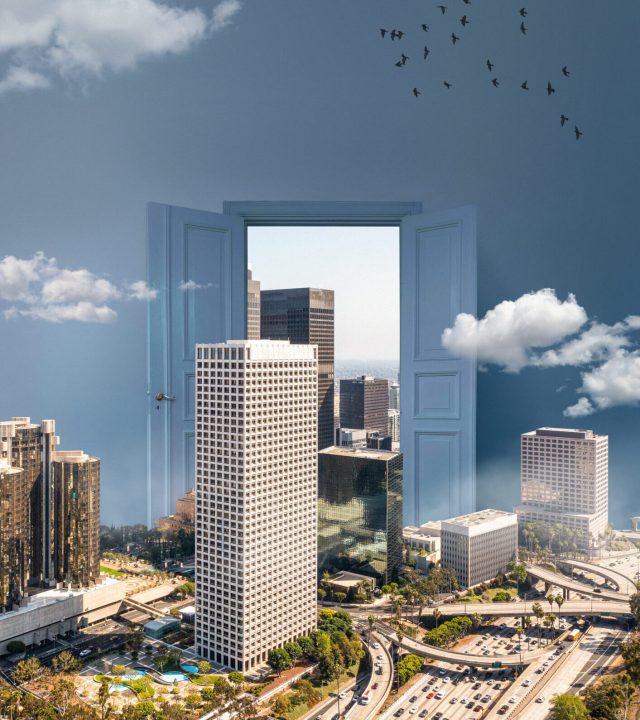 door opening revealing tall buildings